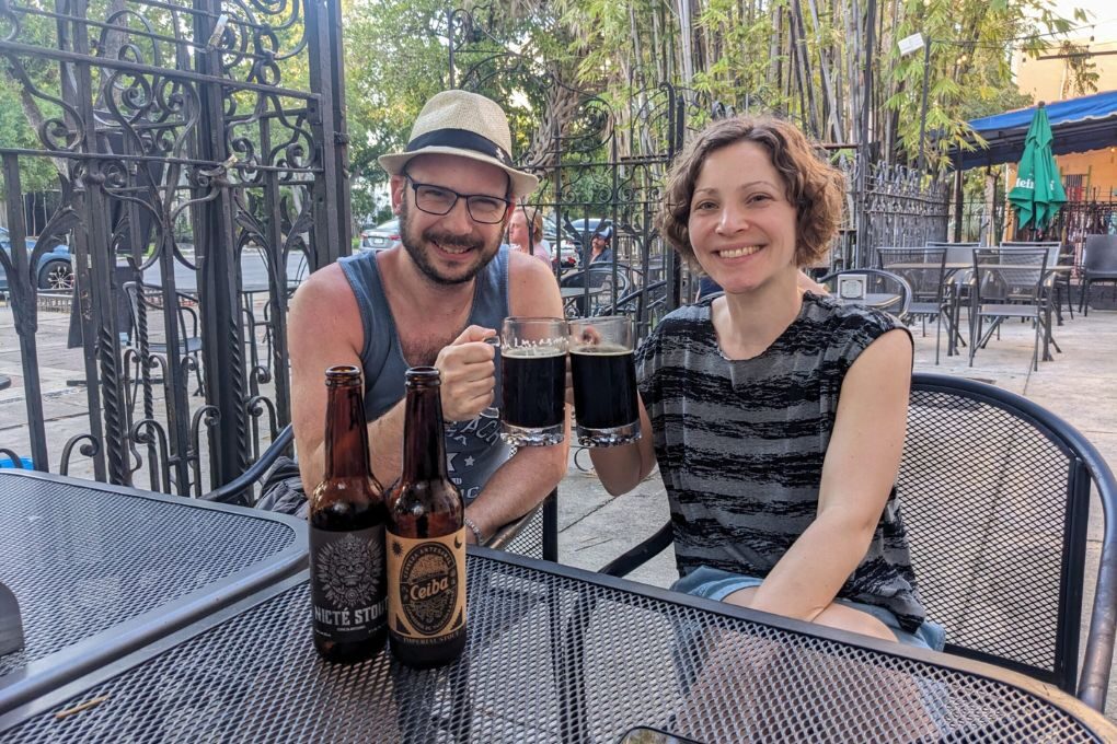 Nico and Christiane from beingirish.berlin posing with beer at the St. Patricks Irish Pub in Valladolid, Mexico
